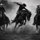 Black and white rodeo-style artwork of an elderly woman riding a wild bull symbolising the emotional cost of poor UX and debt collection systems.